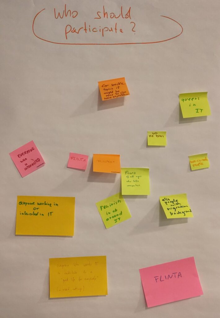 Flip-chart with post-its on it, collecting ideas on who should participate in feminist IT exchanges.